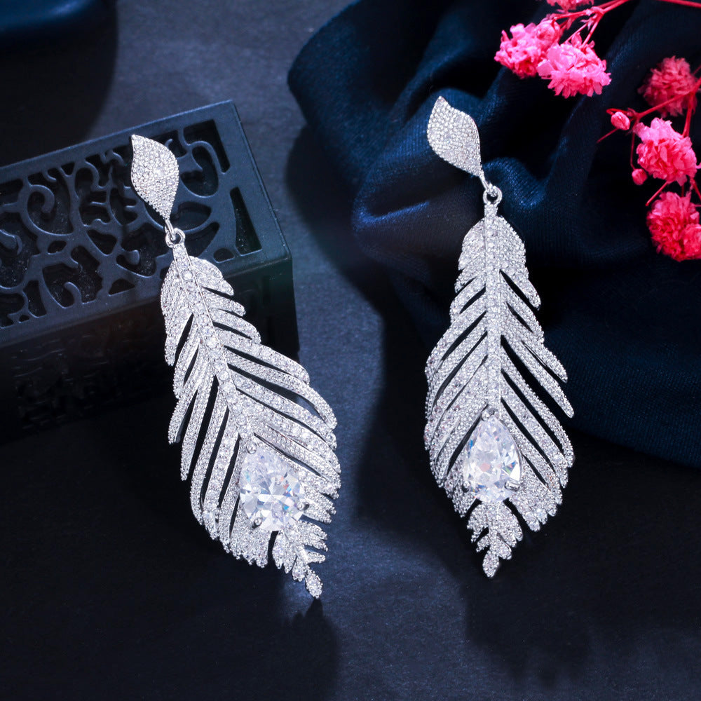 Boucles d’Oreilles "Plume d’Éclat"
