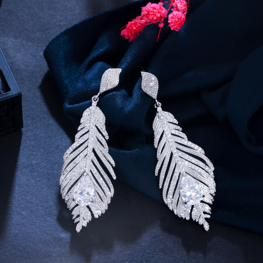 Boucles d’Oreilles "Plume d’Éclat"